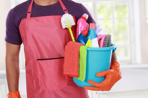 Clean garments prepared by Stockwell cleaners in a professional laundry setting